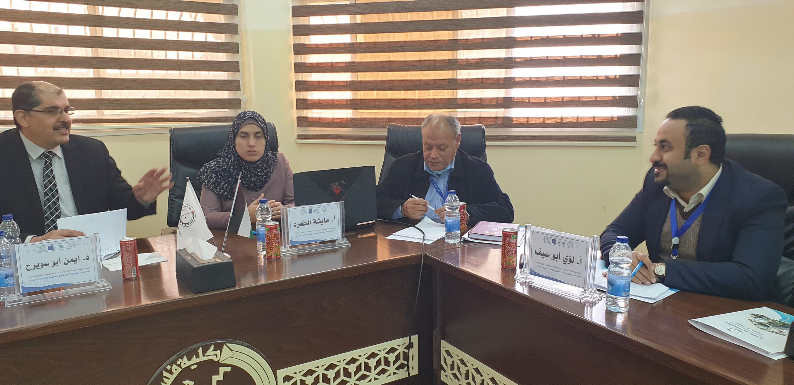 Dr. Mohamed Elnaggar and Aisha Ahmad El-Kurd discussion with other teachers