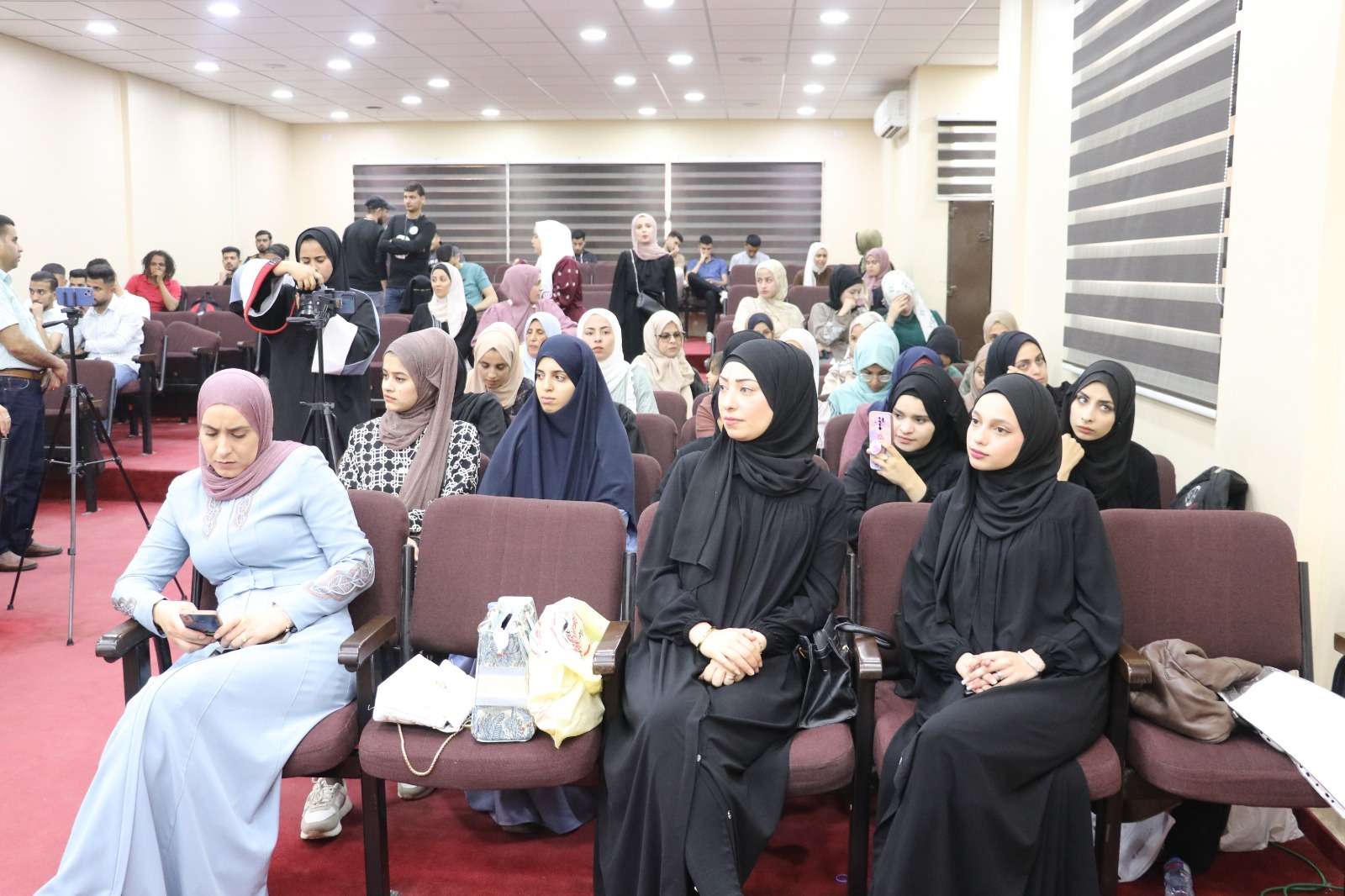 The attendees of the symposium organized by the Department of Information and Applied Arts